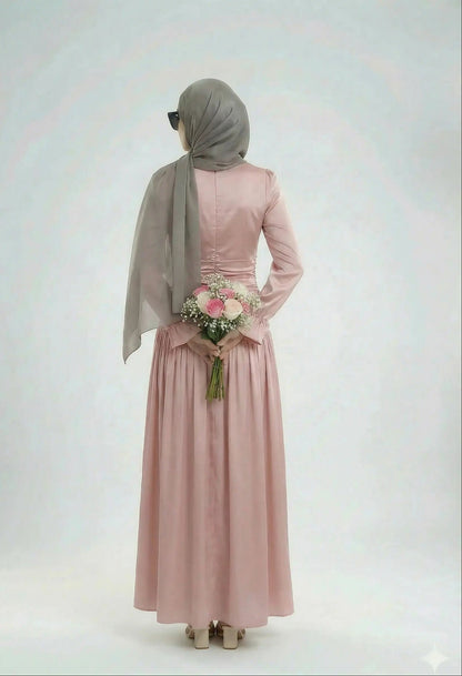 back view of Luna dress Model holding flowers