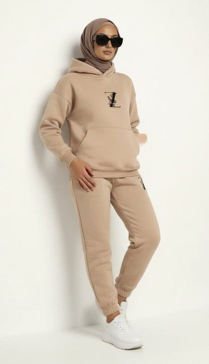 beige side view  color Hoodie + Joggers Zarella set on a hijab model