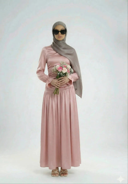 model holding rose flowers and rocking dusty pink Luna dress zarelladesign
