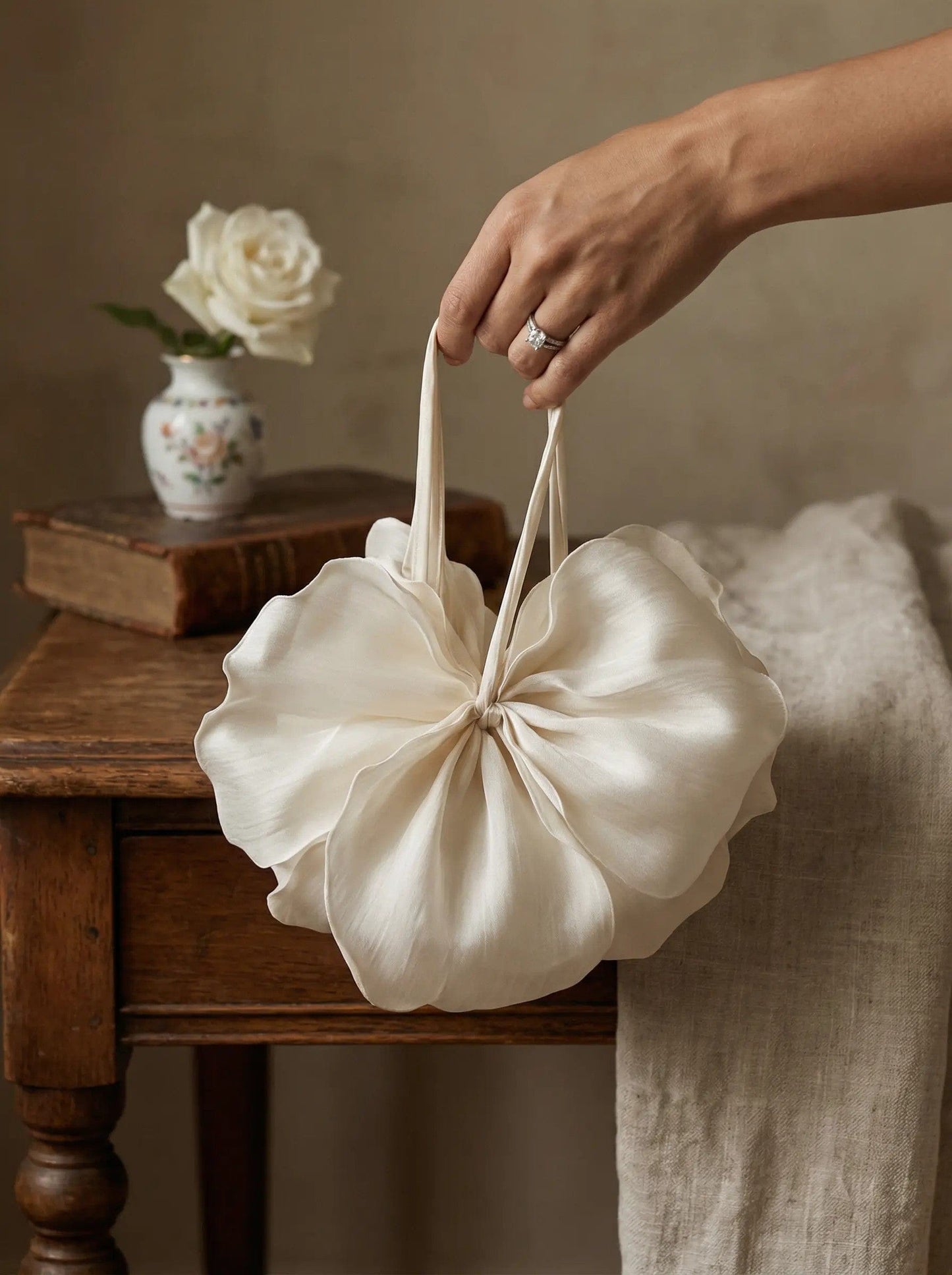 model holding  white mini bag zarella design