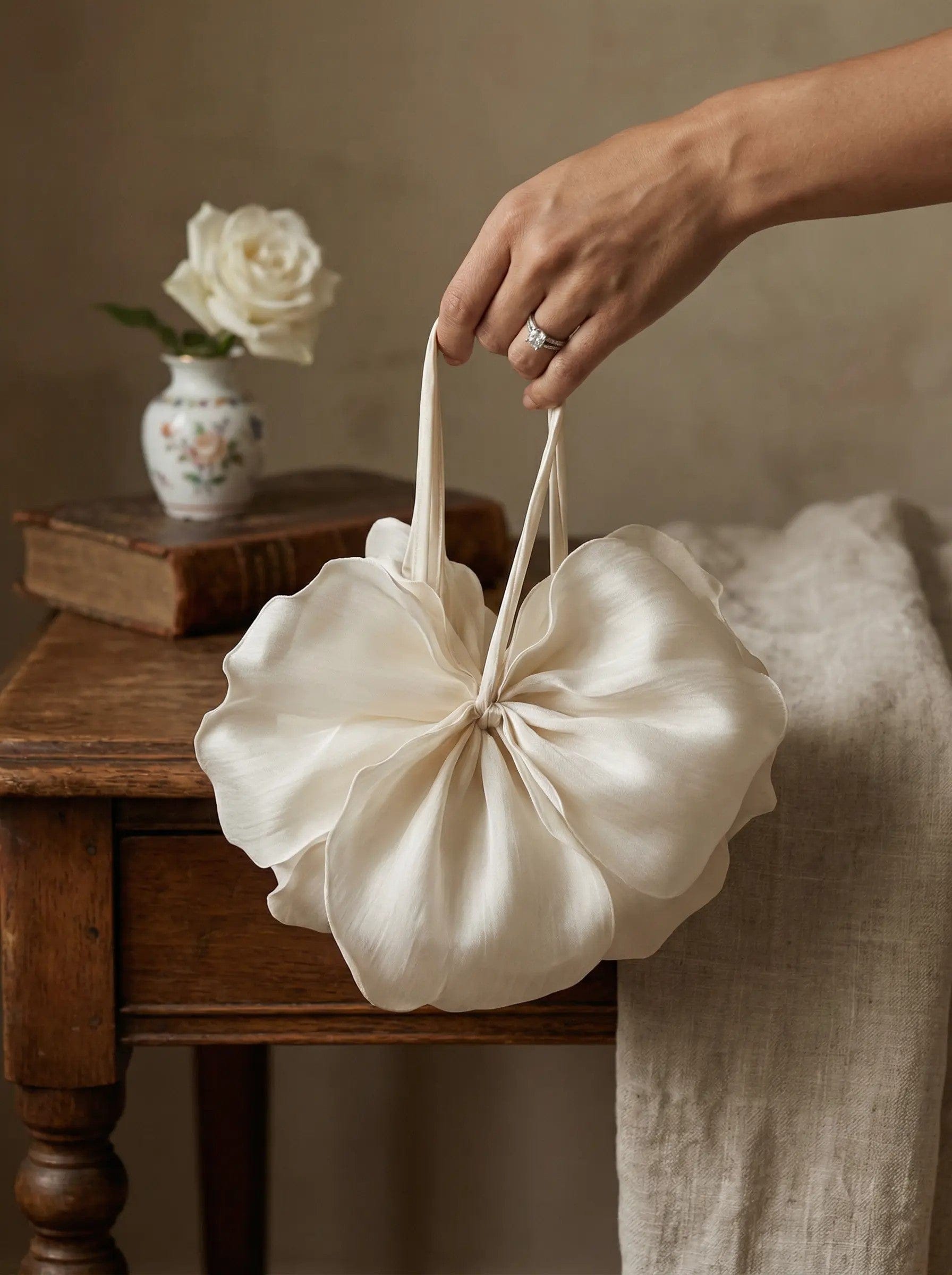 model holding  white mini bag zarella design