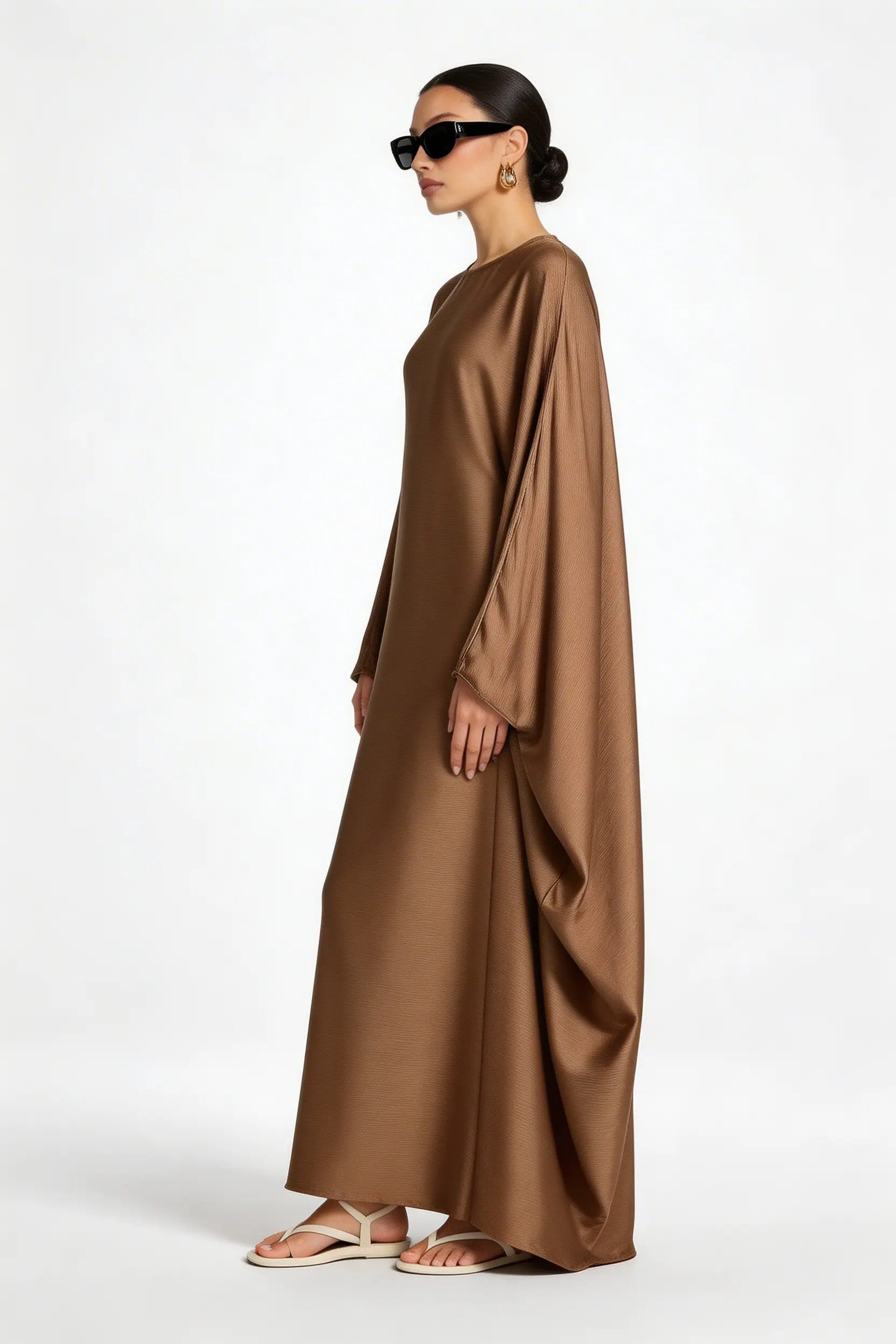 model wearing Kaftan dress front front side left view